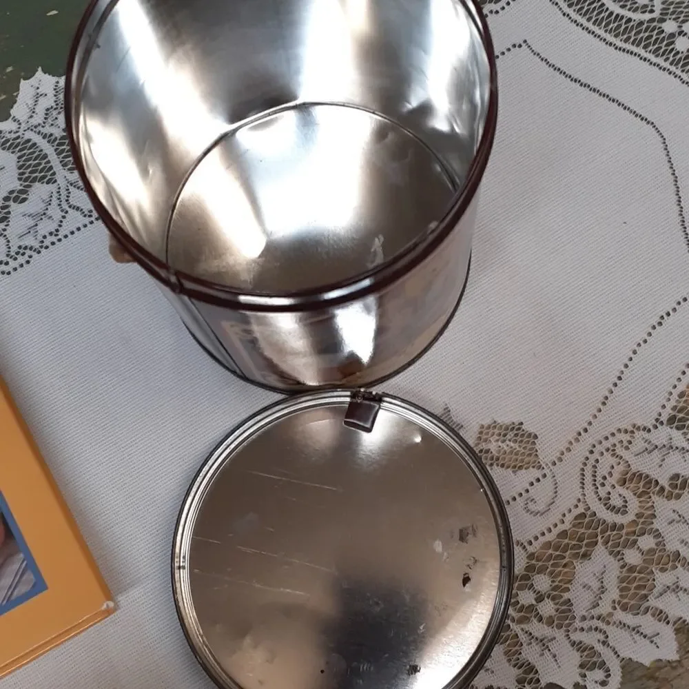 3-pc. Nestle's chocolate bundle: 2 vintage‎ tins and a hardcover cookbook